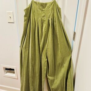 Green Striped jumpsuit with tie shoulder and button can be worn backwards worn 1